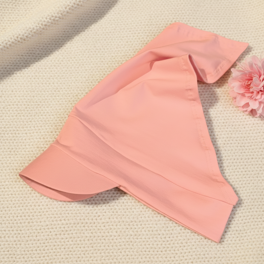 Baby pink headscarf on knitted fabric